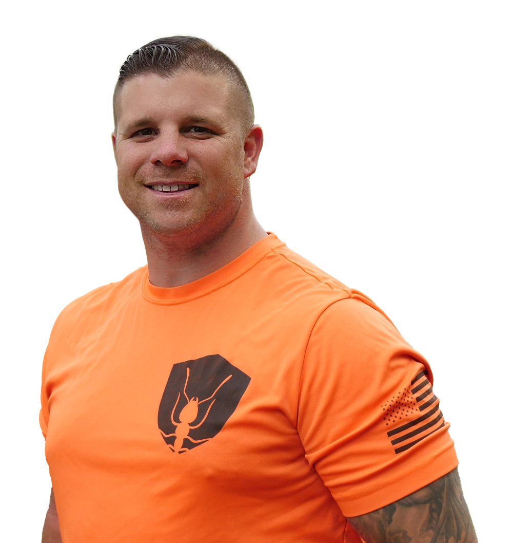 Rob Jordan, owner of Bustabug, sprays a house for pest protection